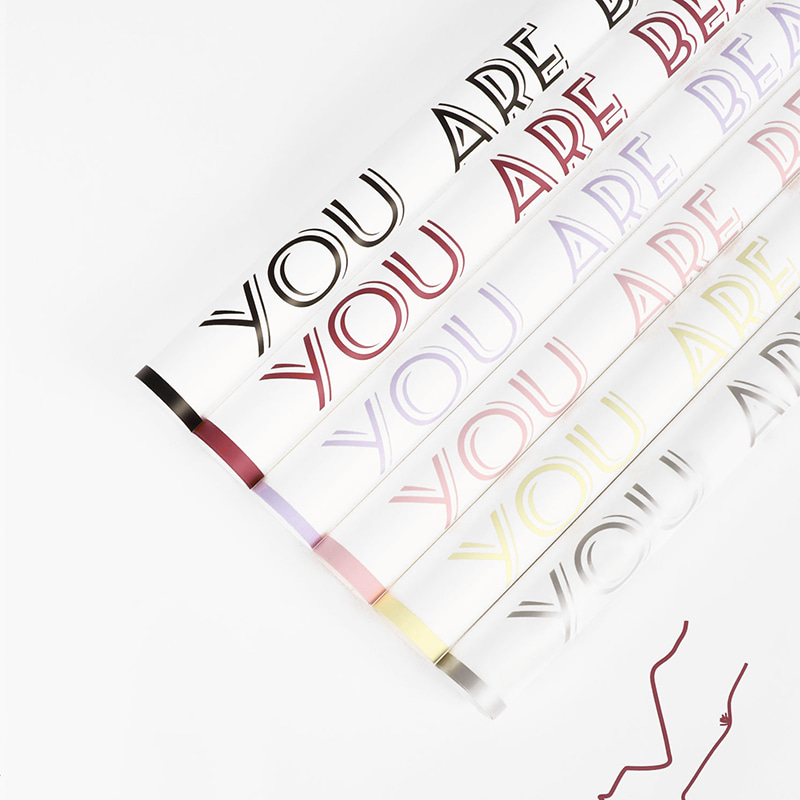 Balenie čerstvých kytíc anglický umelecký papier